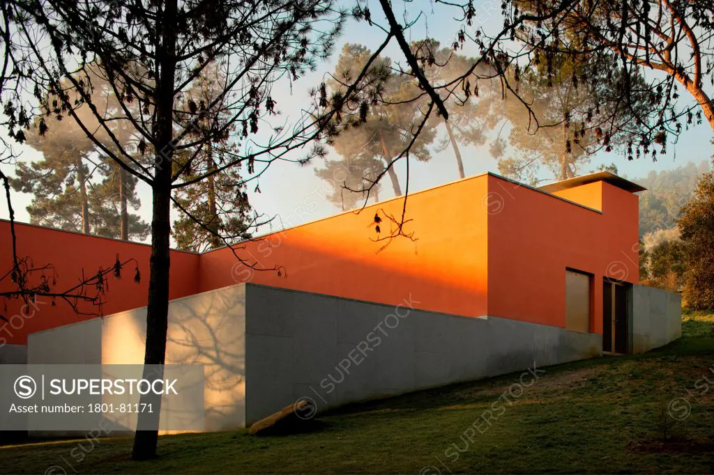Vidago Palace & Spa, Vidago, Portugal. Architect: Alvaro Siza-Vieira, 2012. Sienna-Coloured Extension Detail In Parkland.