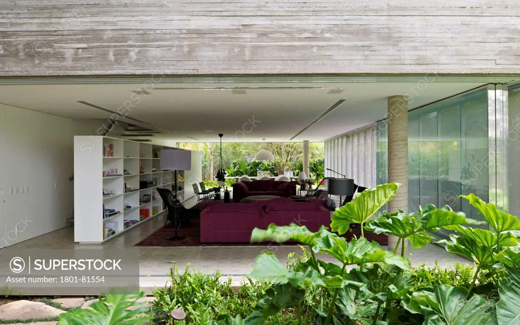 Casa Cubo, Sao Paulo, Brazil. Architect: Studio Mk27- Marcio Kogan, 2012. General View Of Living And Dining Room With Metal Screens Partially Closed.