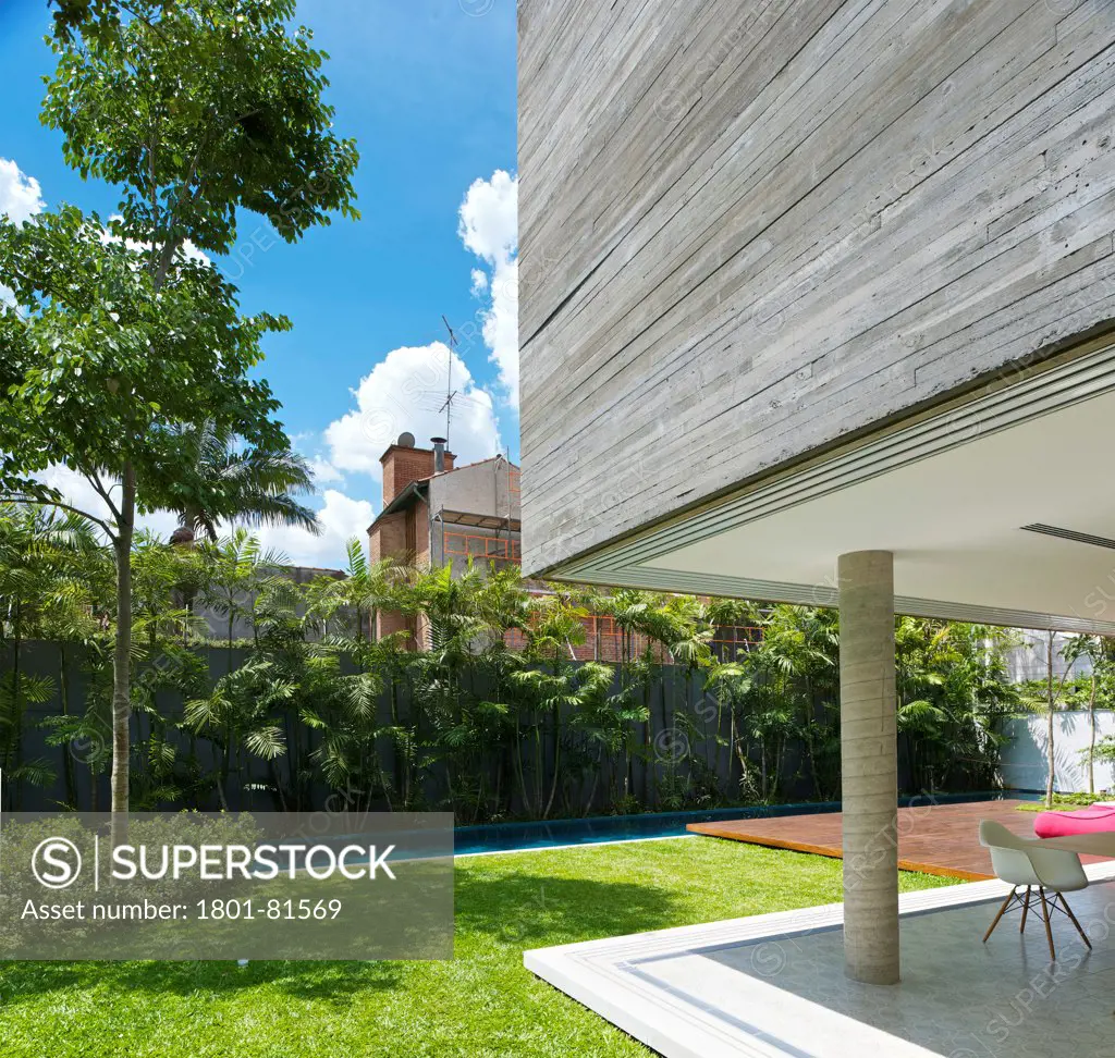 Casa Cubo, Sao Paulo, Brazil. Architect: Studio Mk27- Marcio Kogan, 2012. Detais Showing Concrete Facade, Column And Garden.