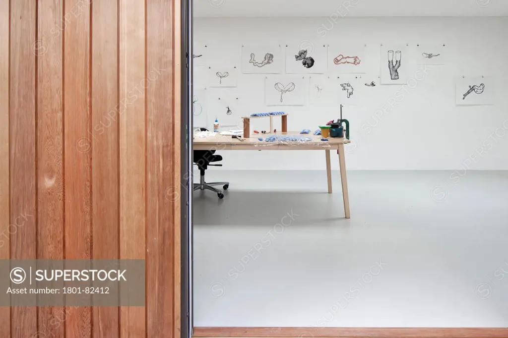 Ecospace Artist Studio Blackheath, London, United Kingdom. Architect: ecospace, 2012. Exterior wood cladding with interior of artist studio.