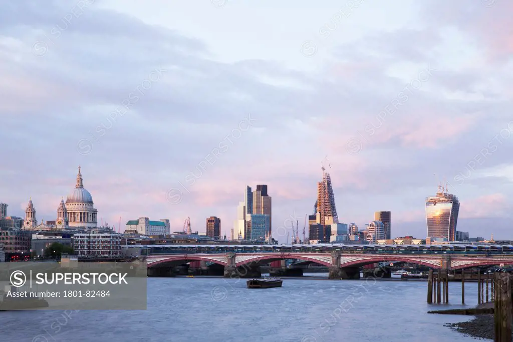 River Thames View, London, United Kingdom. Architect: N/A, 2013. Looking east towards the city of  London  down the river Thames. Notable buildings from left to right are St Paul's Cathedral, Tower 42, The Cheese Grater, under construction and The Walkie Talkie under construction. Also visible is  the new Blackfriars bridge station.