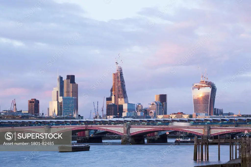 River Thames View, London, United Kingdom. Architect: N/A, 2013. Looking east  towards the city of  London down the river Thames. Notable buildings  from left to right are St Paul's Cathedral, Tower 42, The Cheese Grater, under construction and The Walkie Talkie under construction. Also visible is  the new Blackfriars bridge station.