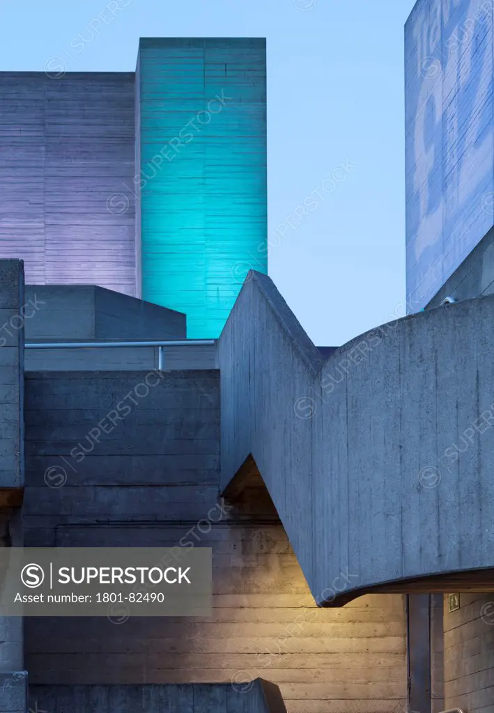 Royal National Theatre, London, United Kingdom. Architect: Denys Lasdun, 1975. Dusk abstract detail of staircase and lighting.
