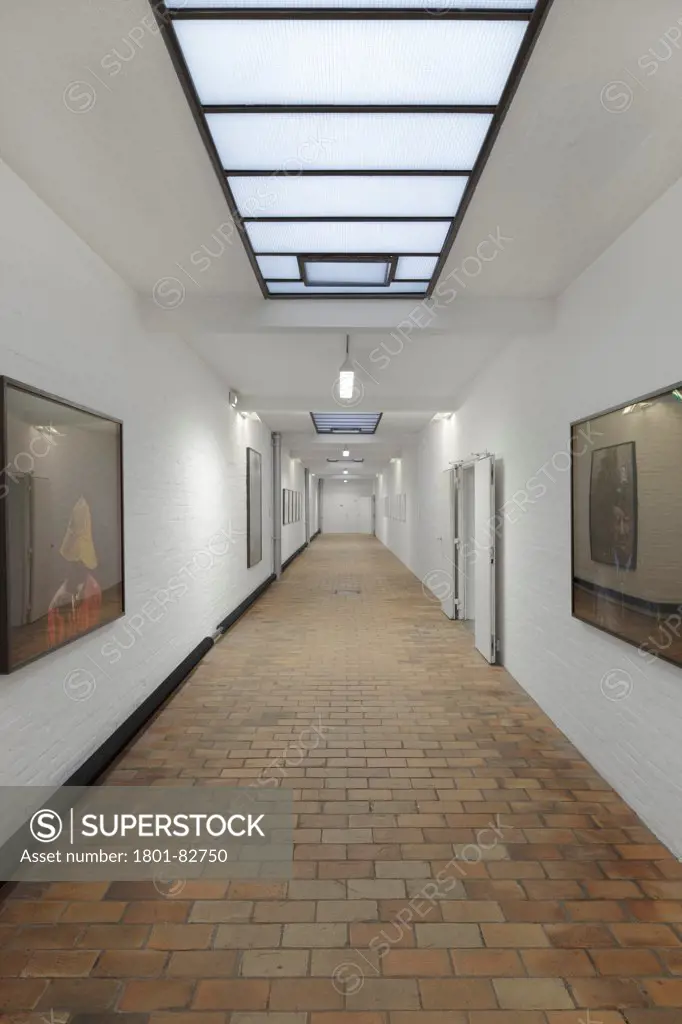 Corridor with tiled floor, paintings and skylight, De Pont Museum of Contemporary Art, Tilburg, The Netherlands (architects: Benthem Crouwel Architekten)