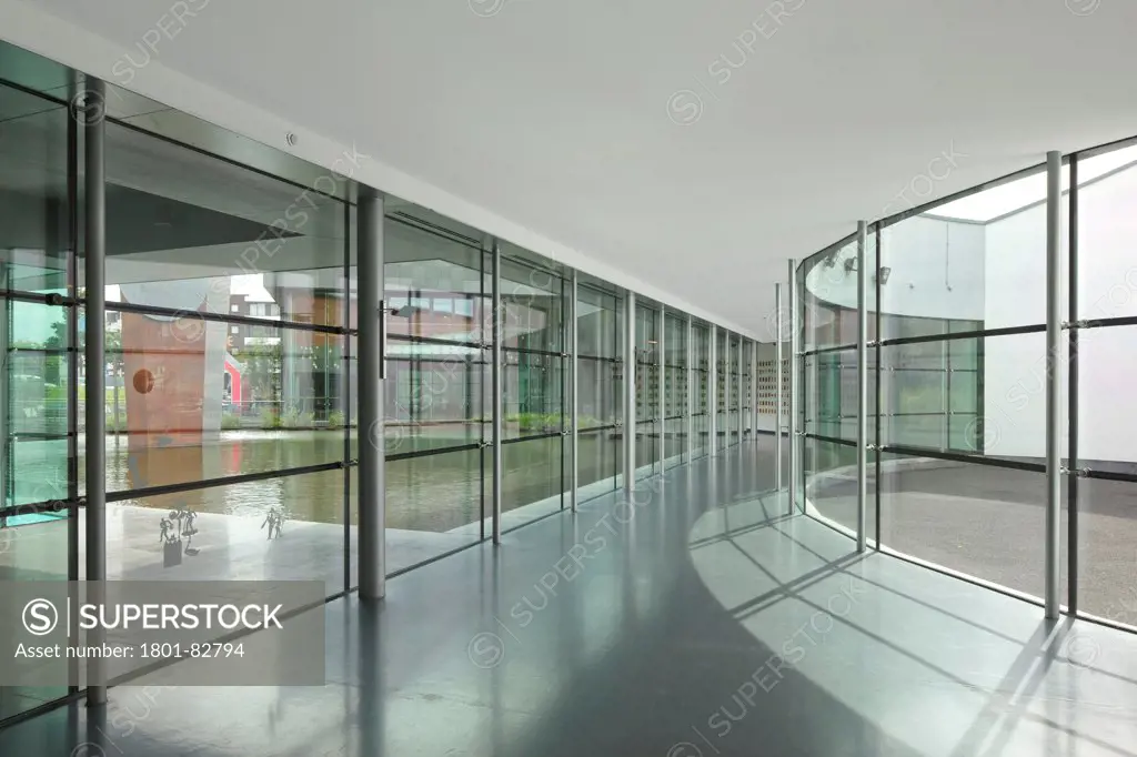 Ground floor corridor with curved window overlooking internal lake, Van Abbemuseum, Eindhoven, The Netherlands (architects: Abel Cahen)