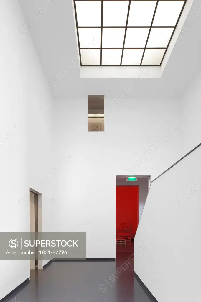 Stairwell leading to exhibition space with skylight and stairs to right, Van Abbemuseum, Eindhoven, The Netherlands (architects: Abel Cahen)