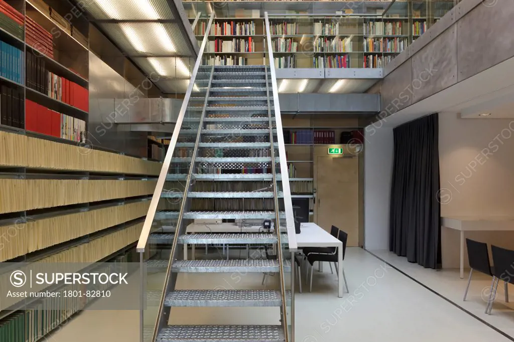 Lowest level of library with staircase and meeting room to right, Van Abbemuseum, Eindhoven, The Netherlands (architects: Abel Cahen)