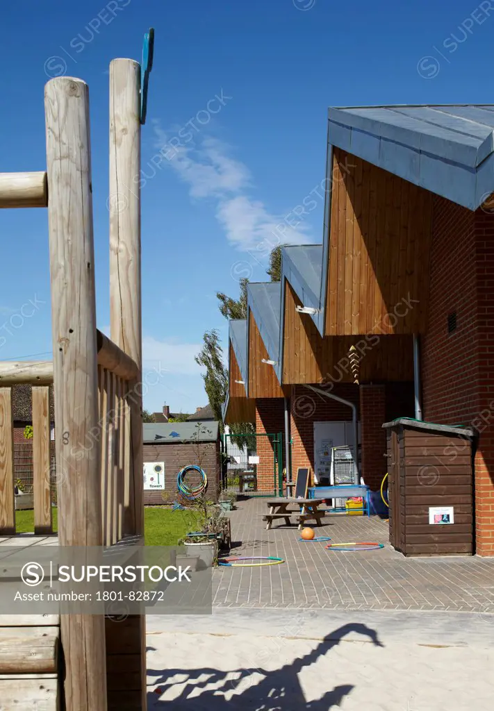 The Winchcombe School, Newbury, United Kingdom. Architect: Architype Limited, 2012. Playground and school facade in perspective.
