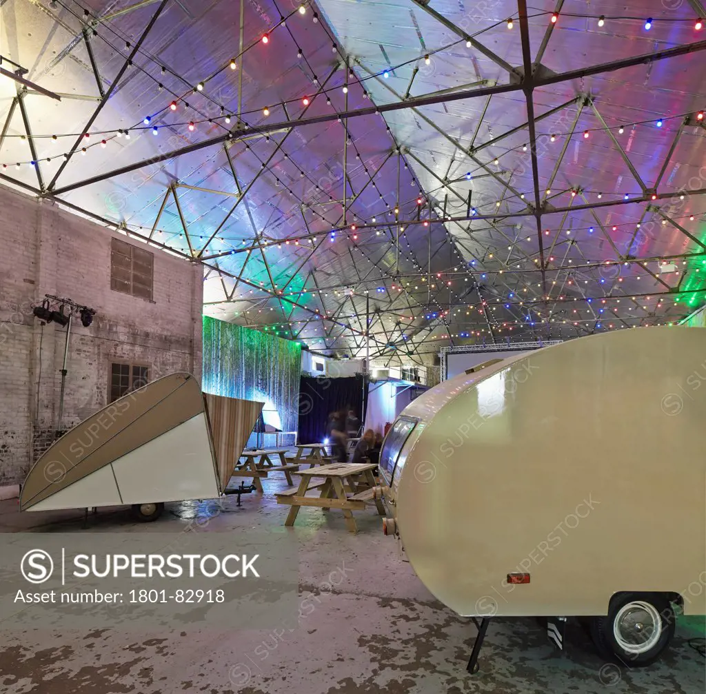 Camp and Furnace, Liverpool, United Kingdom. Architect: FWMA+ and Smiling Wolf, 2012. Multifunctional event hall set up for film screening.