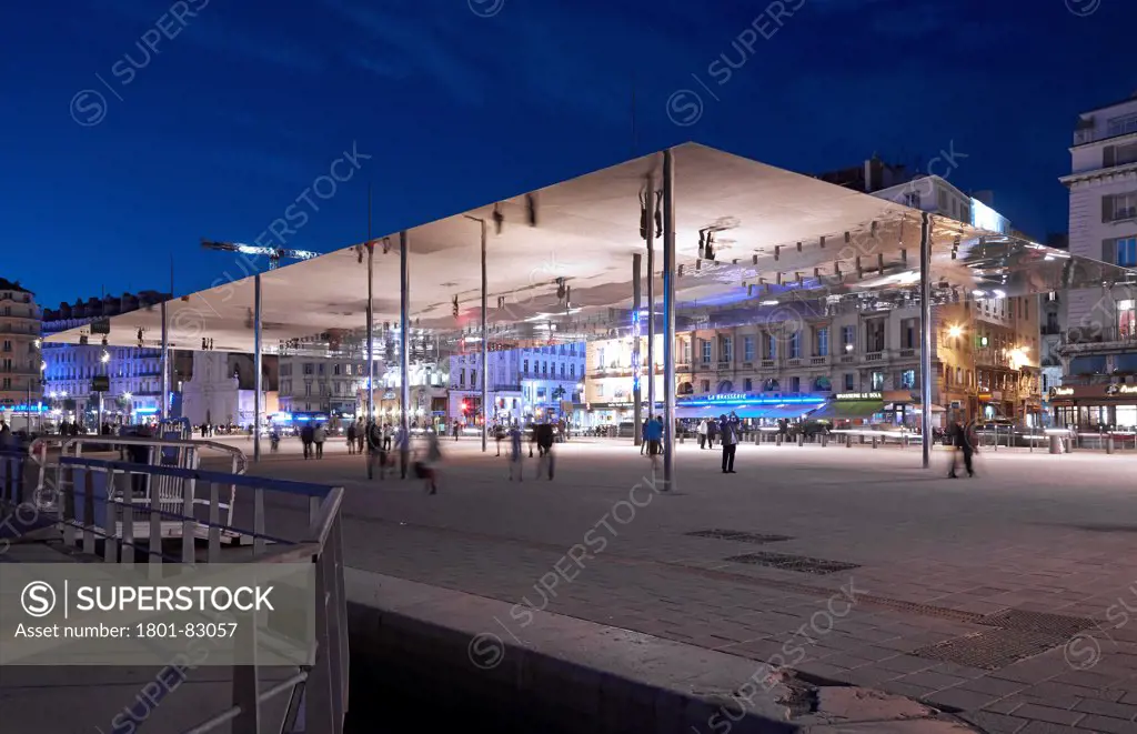 Marseille Vieux Port Pavilion, Marseilles, France. Architect: Foster + Partners, 2013. View Port Pavilion-overall view at twilight.