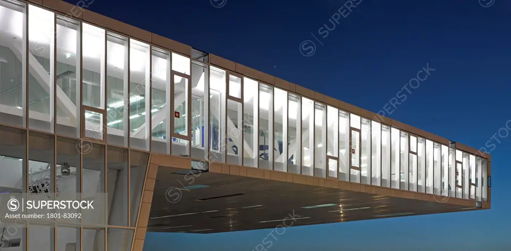 Villa Mediterranee, Marseilles, France. Architect: Stefano Boeri, 2013. Panoramic and detailed view of cantilever building at night.