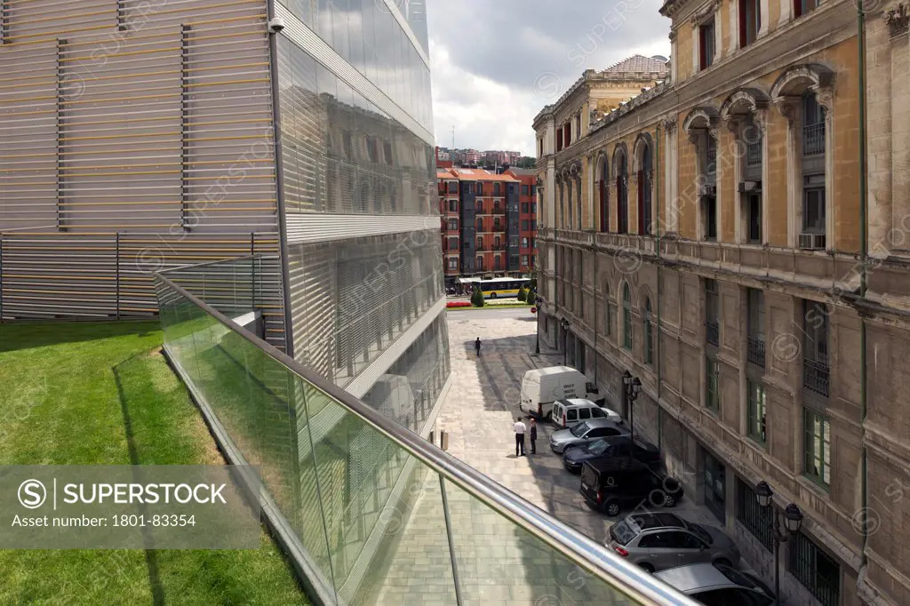 Bilbao City Council, Bilbao, Spain. Architect: IMB Arquitectos , 2010. Elevated view of plaza between old and new buildings.