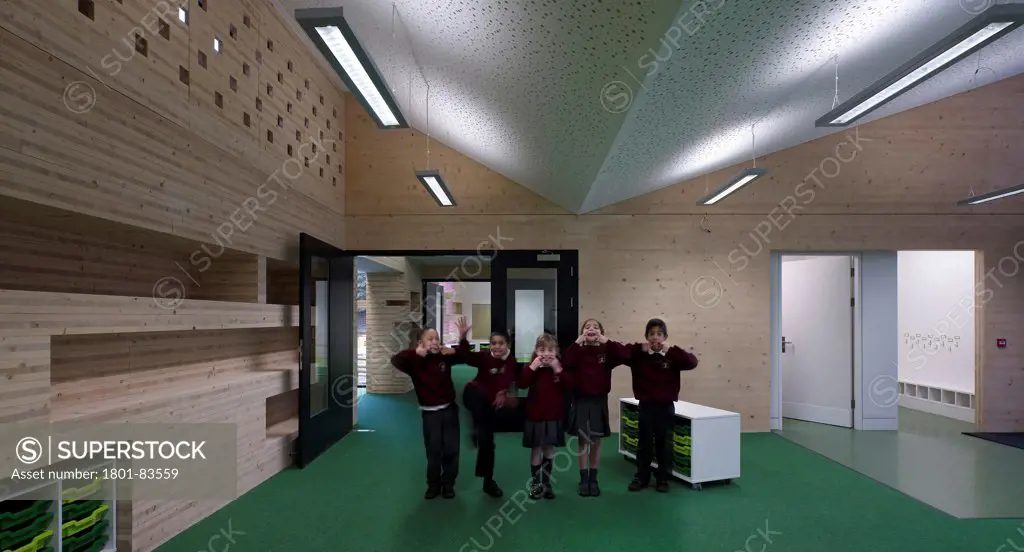 Hayes Primary School, Croydon, United Kingdom. Architect: Hayhurst and Co., 2012. Classroom view through.