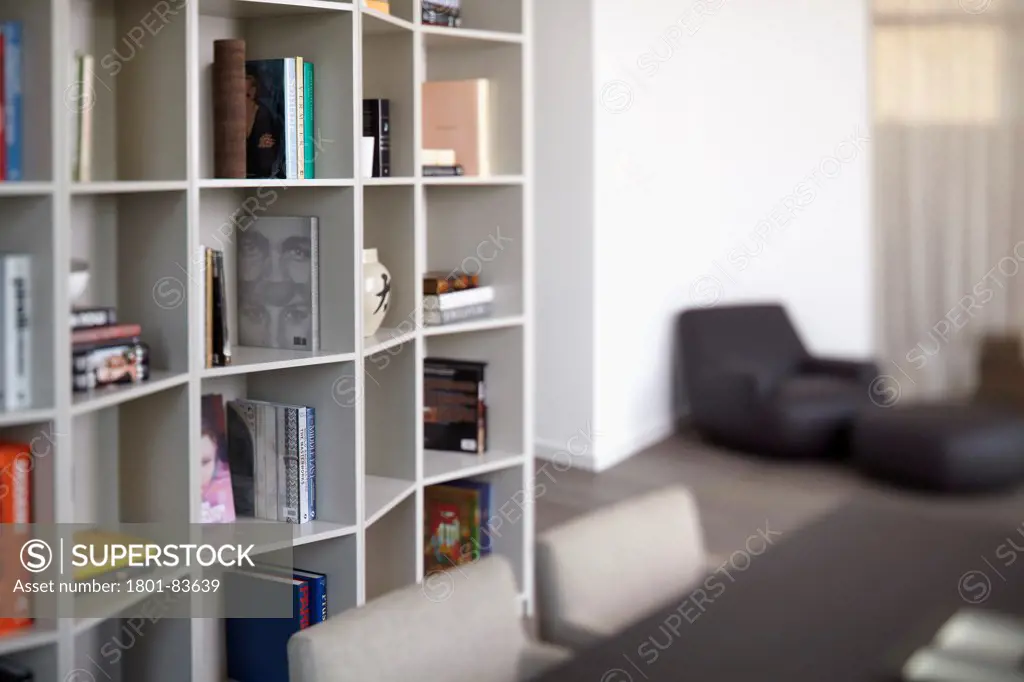 St Mary's Road, London, United Kingdom. Architect: h2 Architecture , 2012. Bookcase and chairs in selective focus.