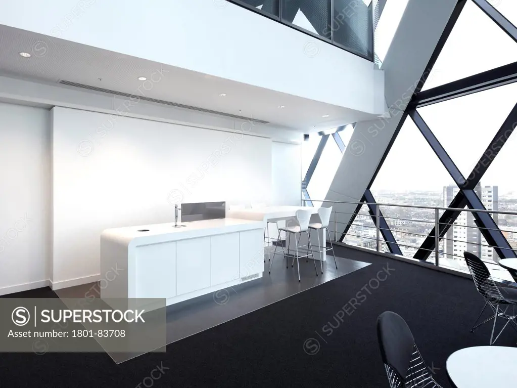 Office space at 30 St Mary Axe (the Gherkin), London, United Kingdom. Architect: Michael O'Sullivan, 2012. Break-out / kitchen space with bespoke units.