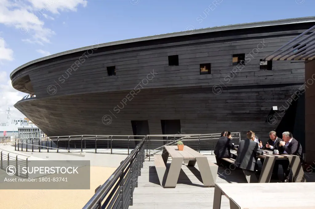 The Mary Rose Museum, Portsmouth, United Kingdom. Architect: Wilkinson Eyre Architects , 2013. External view of museum with cafe balcony.