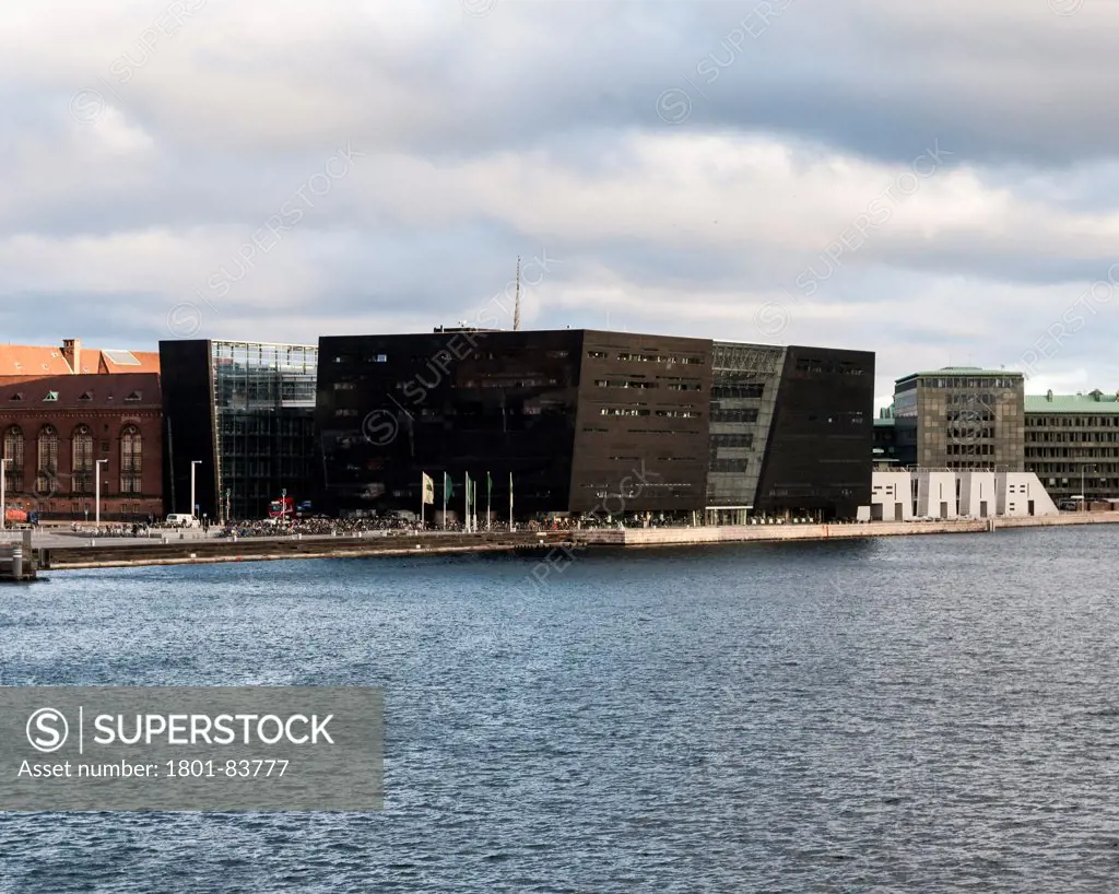 The Black Diamond - The Royal Danish Library, Copenhagen, Denmark. Architect: Schmidt Hammer and Lassen Ltd, 1999. Exterior view across water from Knippelsbro.