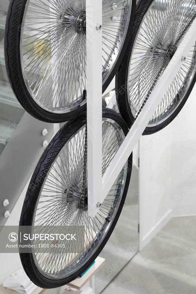 Le Coq Sportif London -FlagshipStore, London, United Kingdom. Architect Studio Oscar, 2013. Abstract detail of the wheels on the Kinetic Bicycle Sculpture.