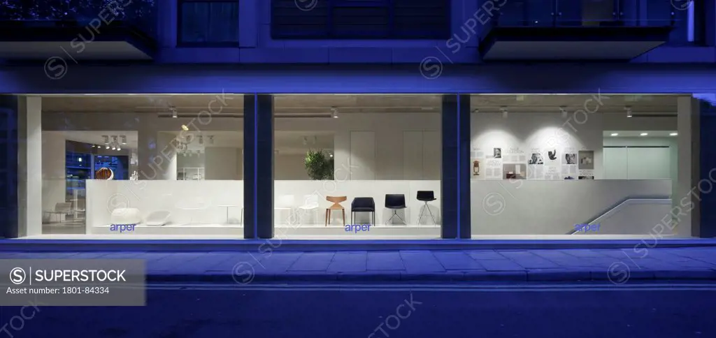Arper London Showroom, London, United Kingdom. Architect 6A, 2012. Panoramic view of large display windows showing display area along the top of the staircase.
