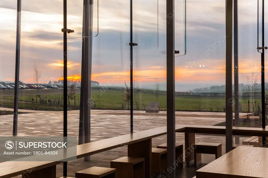 Stonehenge Visitor Centre, Amesbury, United Kingdom. Architect Denton Corker Marshall LLP, 2013. View towards the west from inside cafe.