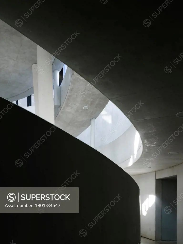 Alesia Museum, Alise-Sainte-Reine, France. Architect Bernard Tschumi Architects, 2012. Detail of concrete stairway curvature.