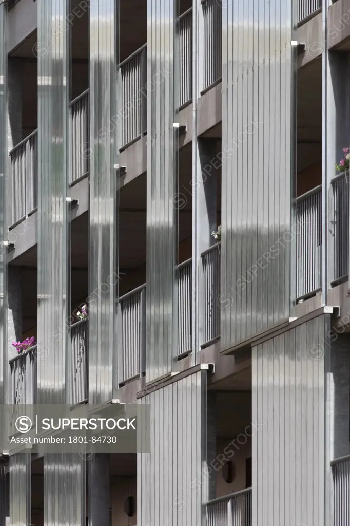 Detail of metallic finish on apartment block facade