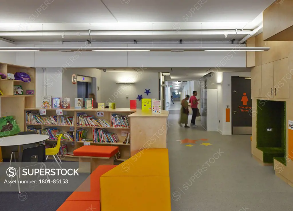 The Livity School, London, United Kingdom. Architect Haverstock Associates LLP, 2013. Children's library and corridor view.