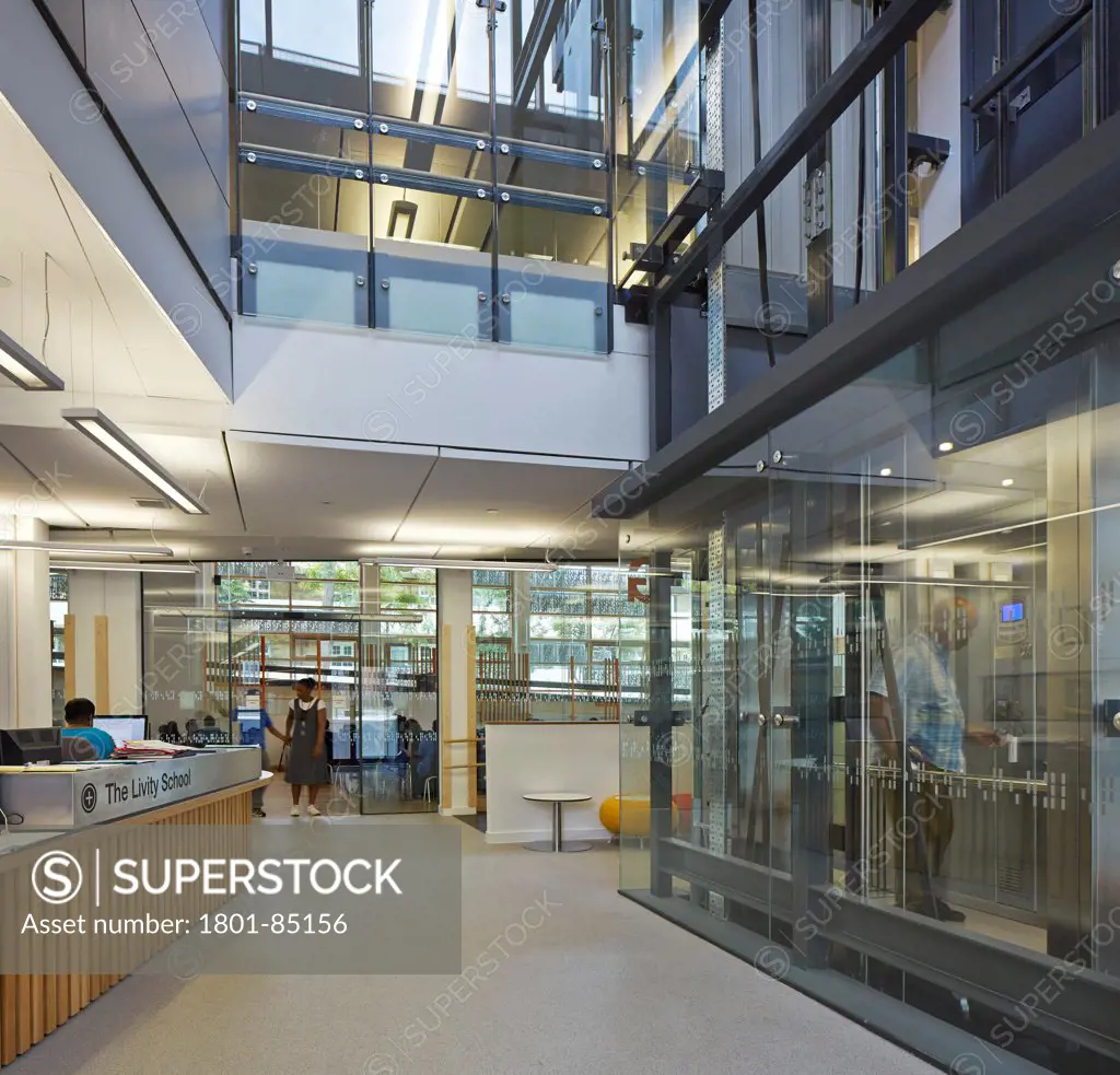 The Livity School, London, United Kingdom. Architect Haverstock Associates LLP, 2013. Reception desk and glazing.