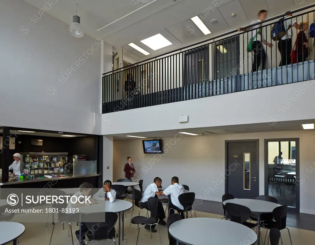 Wednesfield School, Wolverhampton, United Kingdom. Architect Capita Symonds Architecture, 2013. Double-height cafeteria and gallery corridor.