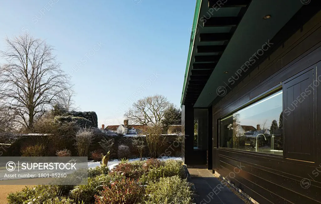 Crowbrook House, Harlow, United Kingdom. Architect Knox Bhavan Architects LLP, 2012. Facade perspective of entrance area.