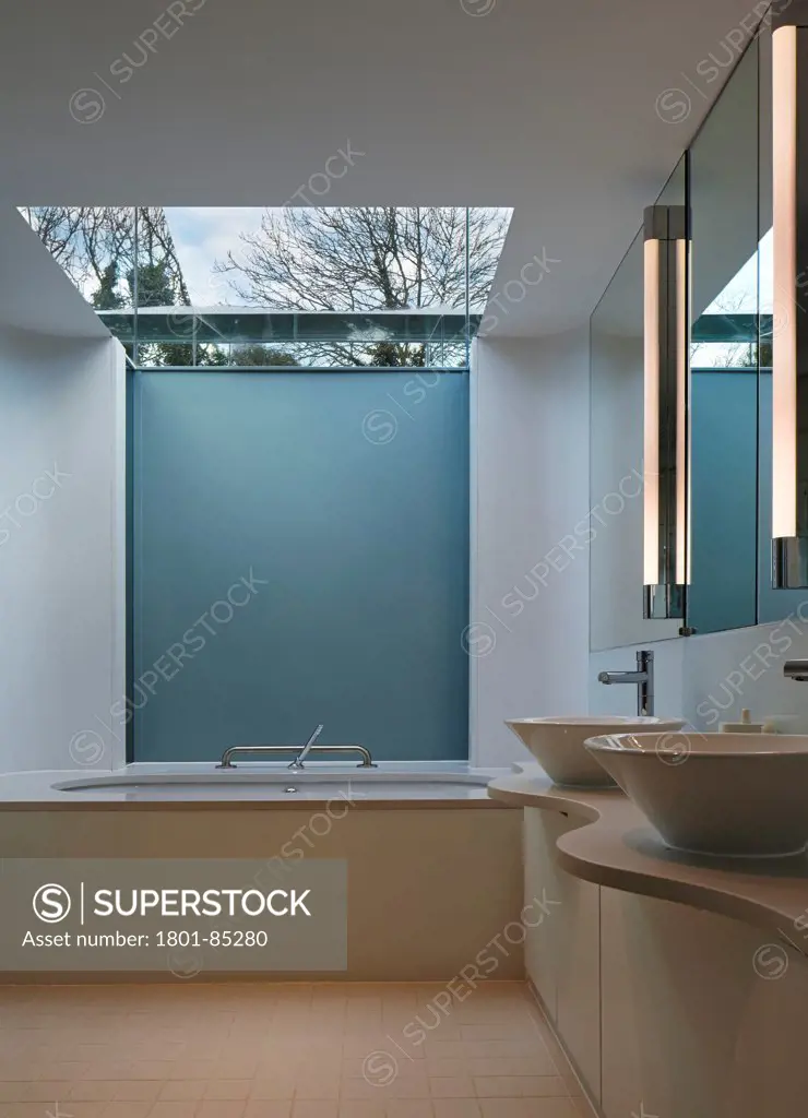 Crowbrook House, Harlow, United Kingdom. Architect Knox Bhavan Architects LLP, 2012. Bathroom with skylight.