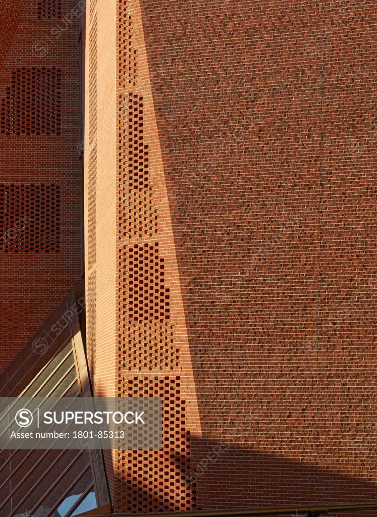 London School of Economics,Saw Swee Hock Students Centre, London, United Kingdom. Architect O'Donnell & Tuomey, 2014. Detail of folded brick facade with entrance canopy.