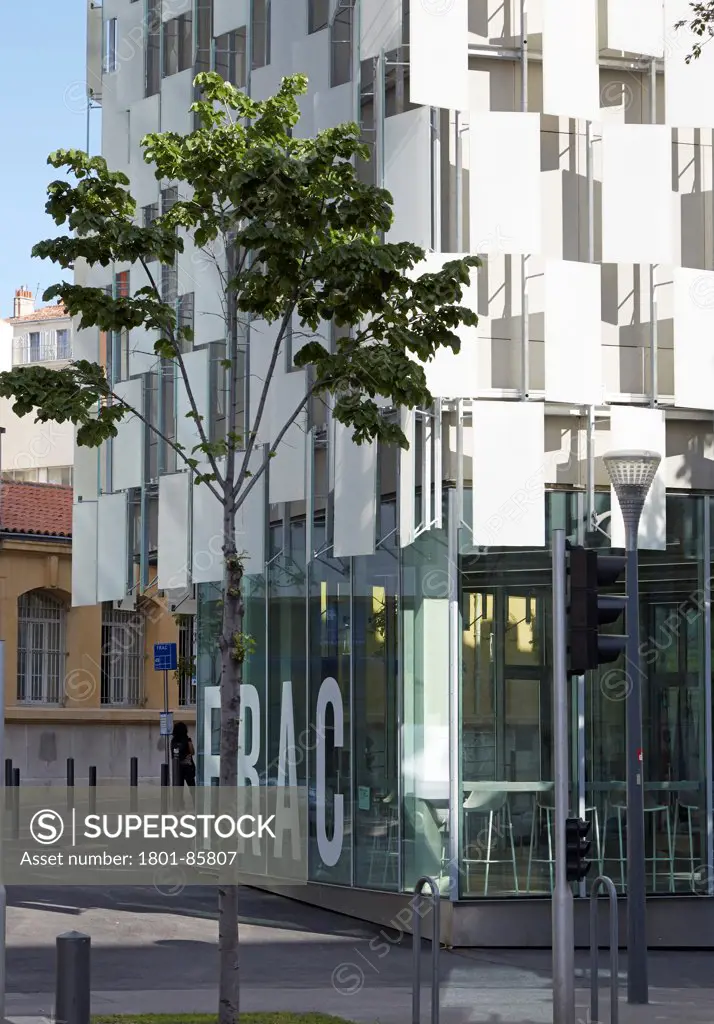 FRAC, Marseille, France. Architect Kengo Kuma, 2013. Exterior view showing cladding and signage.