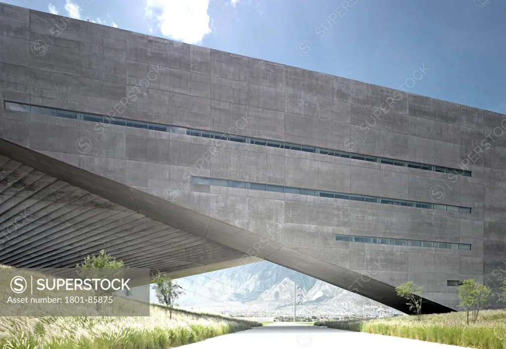 La Universidad de Monterrey (UDEM)-Centro Roberto Garza Sada de Arte Arquitectura y Diseno, Monterrey, Mexico. Architect Tadao Ando, 2013. Frontal facade view with mountains in background.