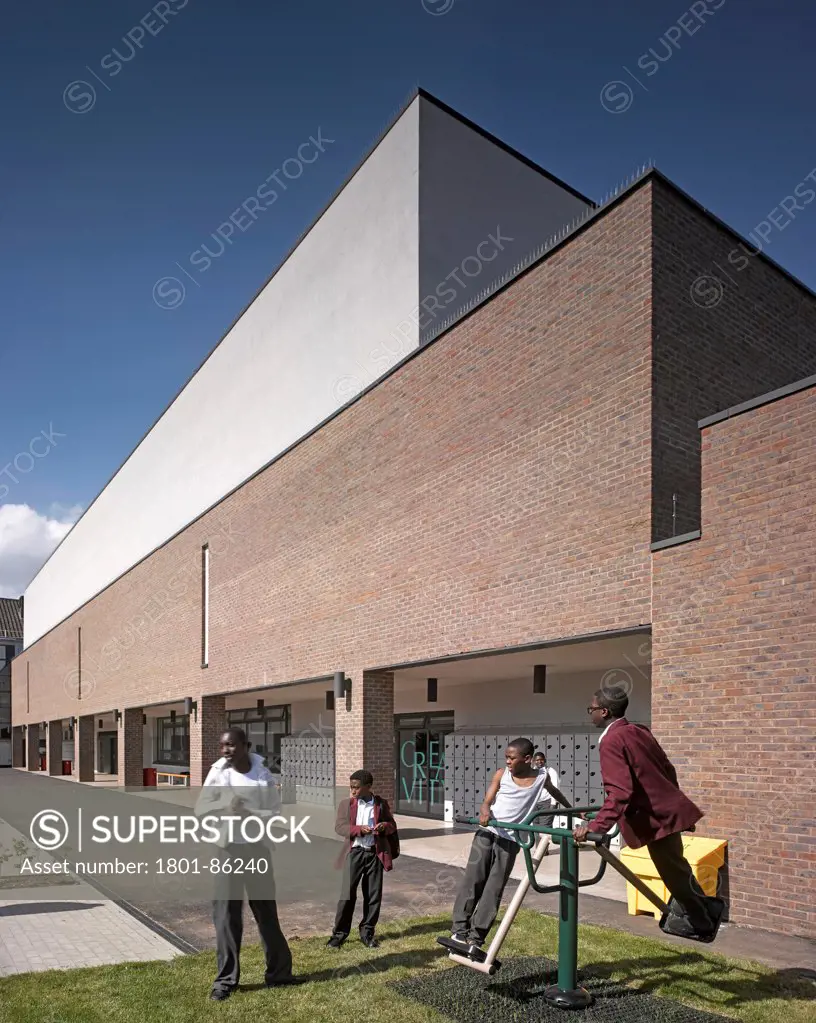 St Thomas the Apostle College, London, United Kingdom. Architect Allies and Morrison, 2013. Exterior View around sports area.