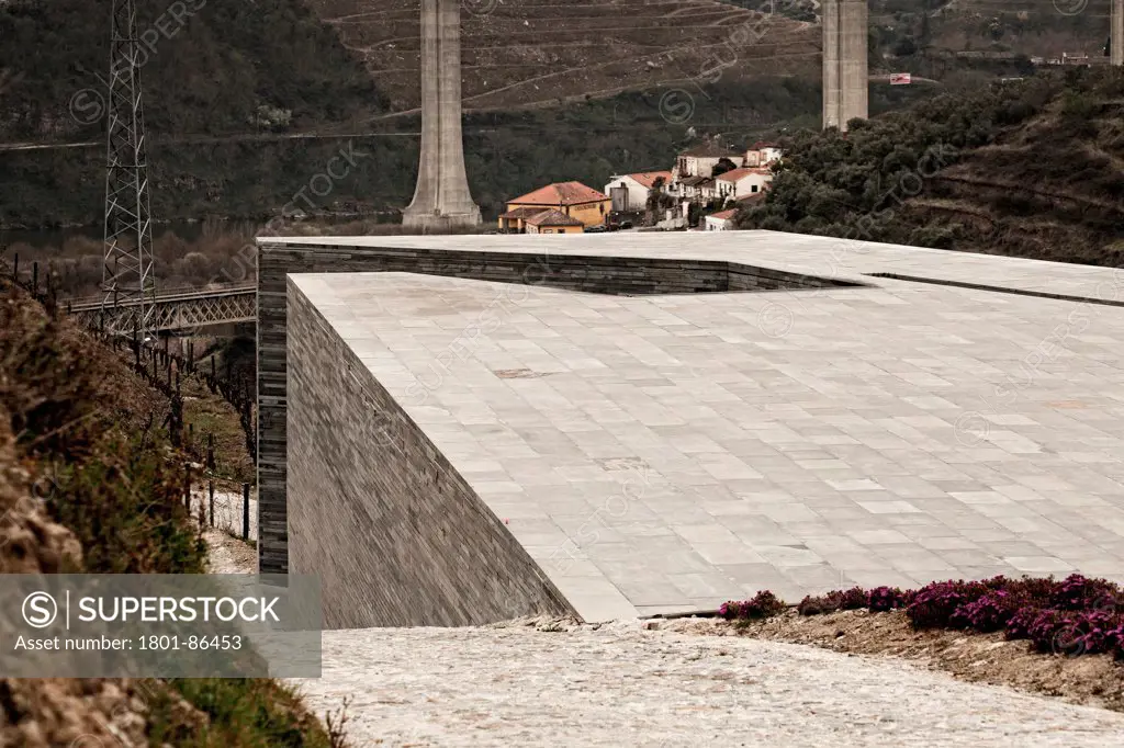 Quinta do Vallado Winery, Peso da Regua, Portugal. Architect Cristina Guedes and Francisco Vieira de Campos, 2013. Angular shale structure in context.