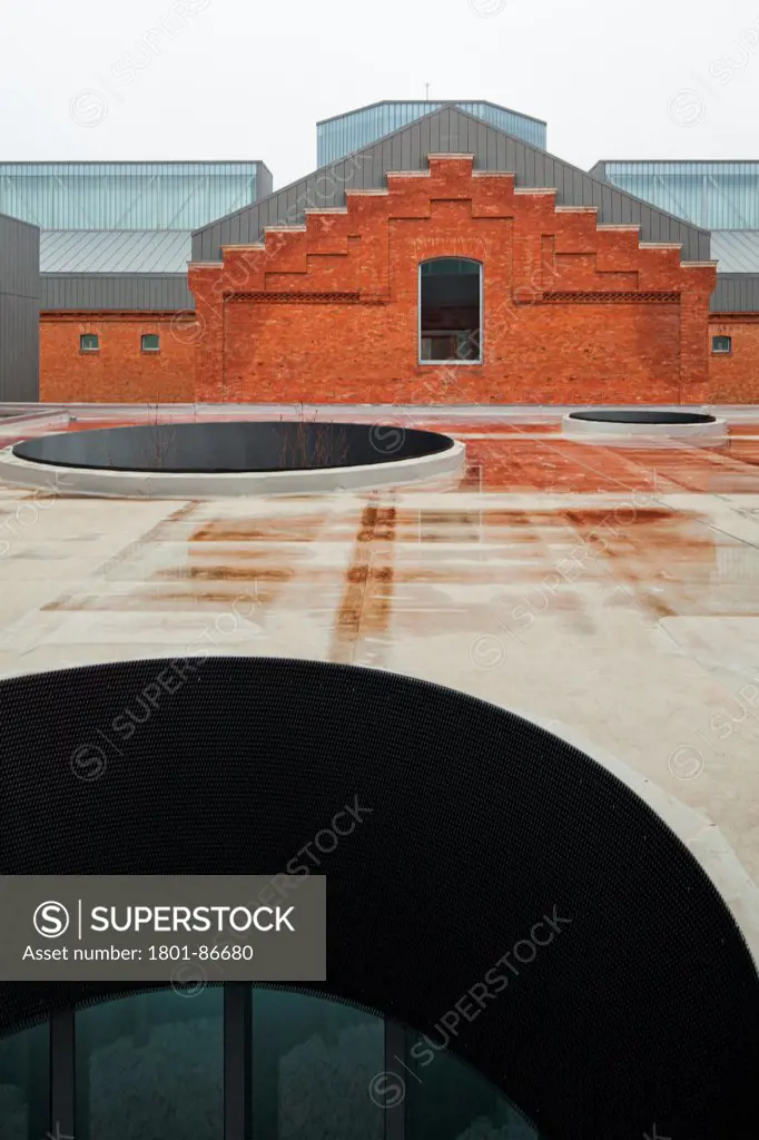 Civic Centre in Palencia, Palencia, Spain. Architect Exit Architects, 2012. Roofscape with skylights and circular light wells.