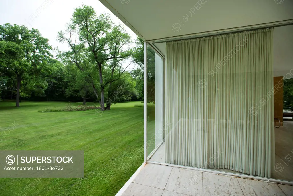 Farnsworth House, Plano, United States. Architect Ludwig Mies van der Rohe, 1951. Partial view of terrace with garden.