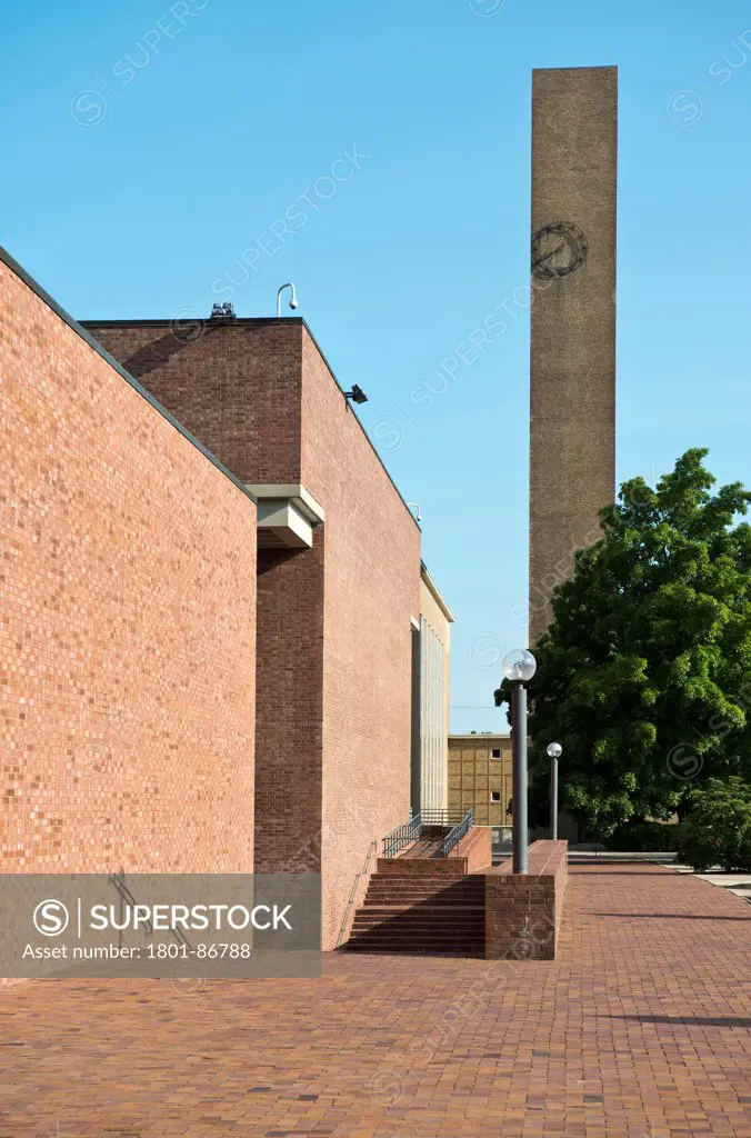 First Christian Church, Columbus, Indiana, Columbus, United States. Architect Eliel Saarinen, 1942. First Christian Church tower, with exterior wall of Cleo Rogers Memorial Library, by IM Pei.