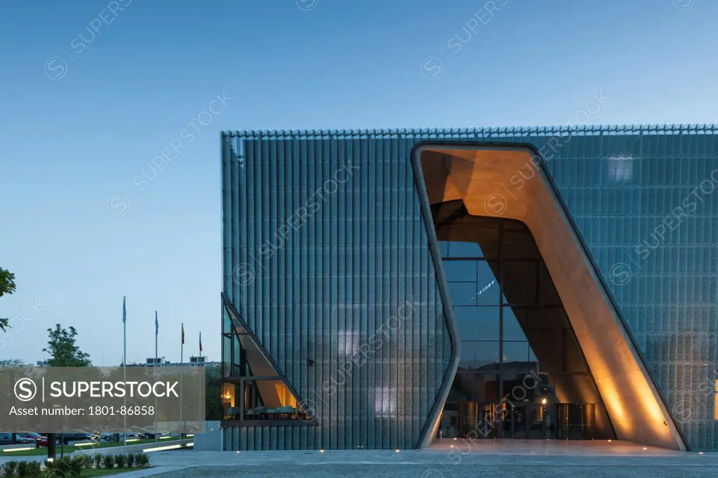 Museum of History of Polish Jews, Warsaw, Poland. Architect Lahdelma & Mahlamaeki, 2013. Detailed evening view of entrance.