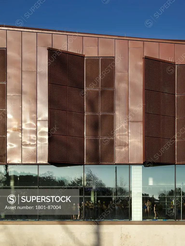 Splashpoint Leisure Centre, Worthing, United Kingdom. Architect Wilkinson Eyre Architects, 2013. West facade window detail with swimmers.