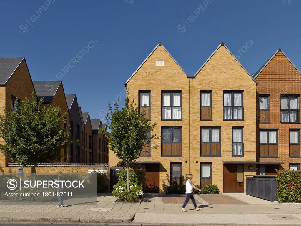 Kidbrooke Village, London, United Kingdom. Architect Lifschutz Davidson Sandilands, 2013. Row of social houses.