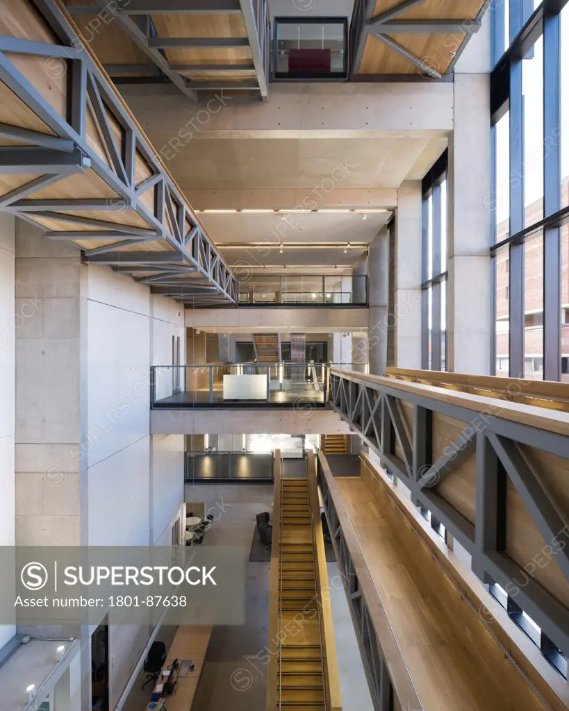 Manchester School of Art, Manchester, United Kingdom. Architect Feilden Clegg Bradley Studios LLP, 2013. Wide view of atrium space.