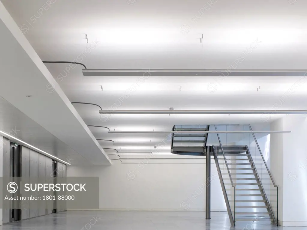 One Valentine Place, London, United Kingdom. Architect Stiff + Trevillion Architects, 2013. Unfurnished office area with stairway.