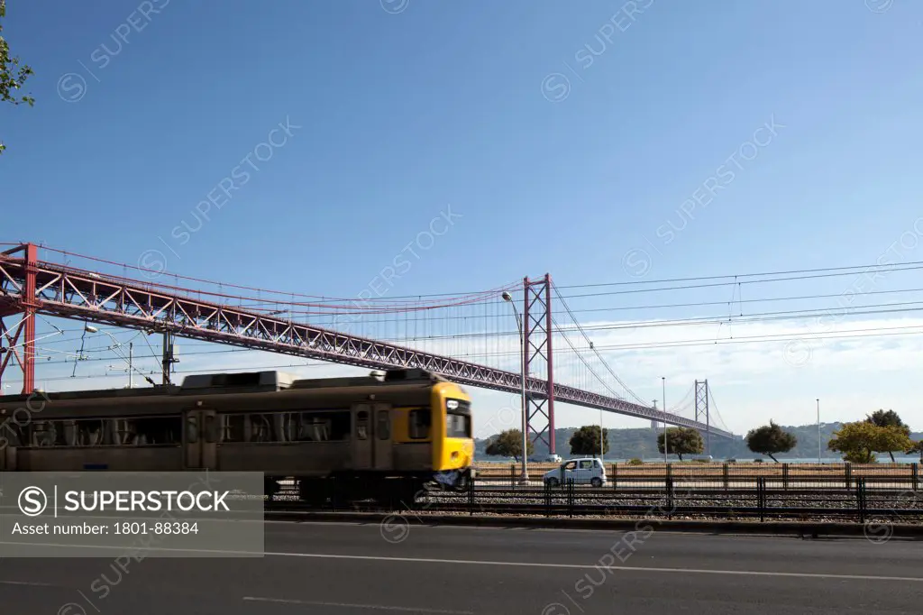 25 de Abril Bridge, Lisbon, Portugal. Architect Steinman, Boynton, Gronquist & Birdsall, 1966. Train passing the bridge.