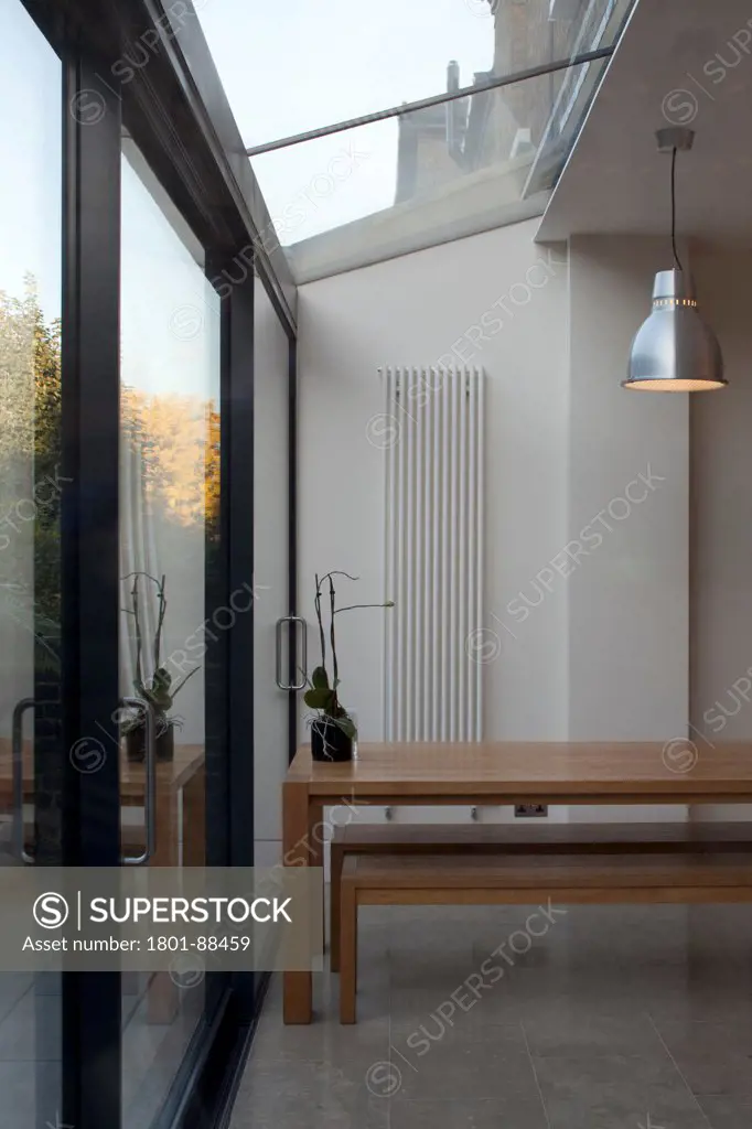 Dents Road, London, United Kingdom. Architect h2 Architecture, 2012. View of dining table.