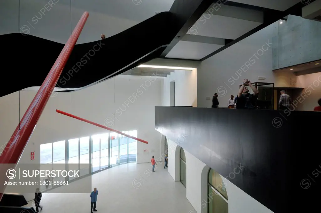Maxxi, Rome, Italy. Architect Zaha Hadid, 2009. Interior view of entrance hall view of staircases and suspended corridors.