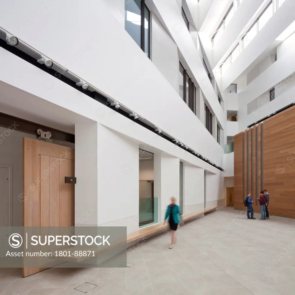 Chetham's School of Music, Manchester, United Kingdom. Architect Stephenson ISA Studio, 2013. Triple height atrium with over looks.  Large fins channel daylight.