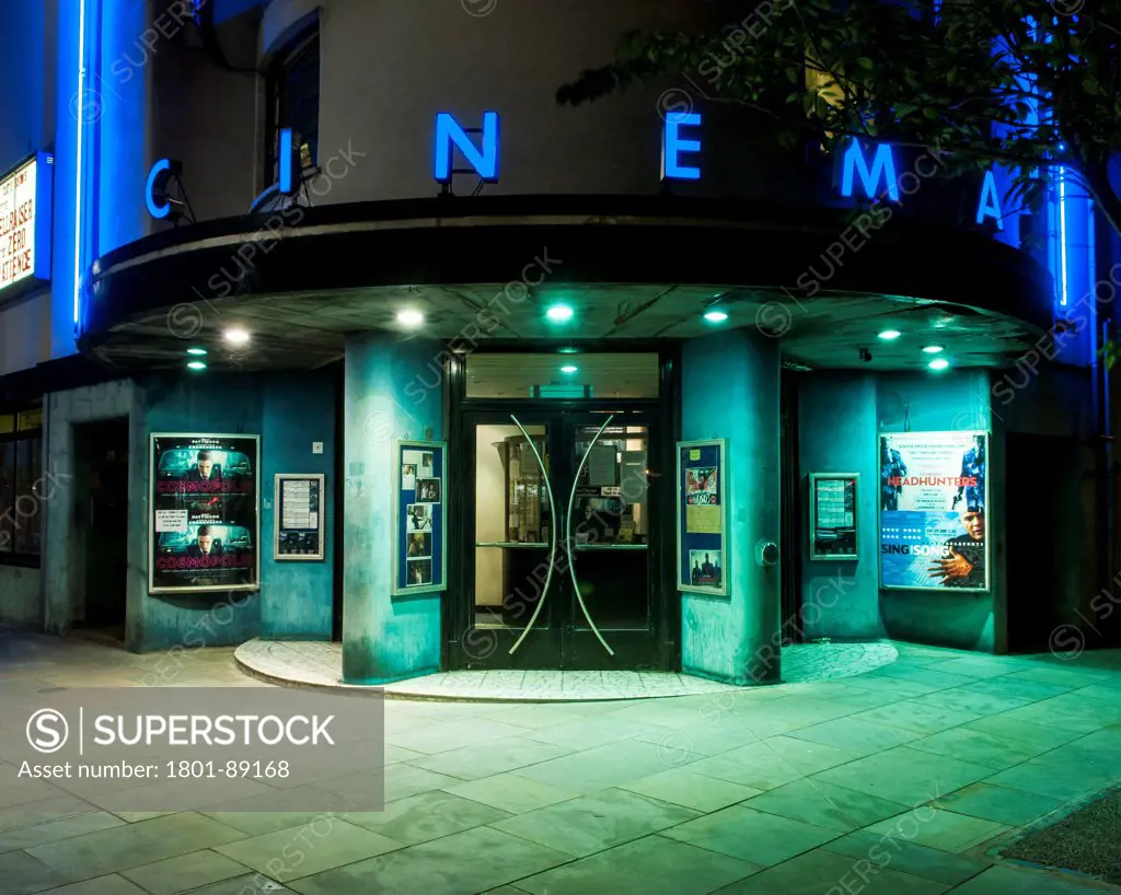 Rio Cinema, London, United Kingdom. Architect Burrell Foley Fischer LLP + F E Bromige, 1937. Entrance to cinema at night.