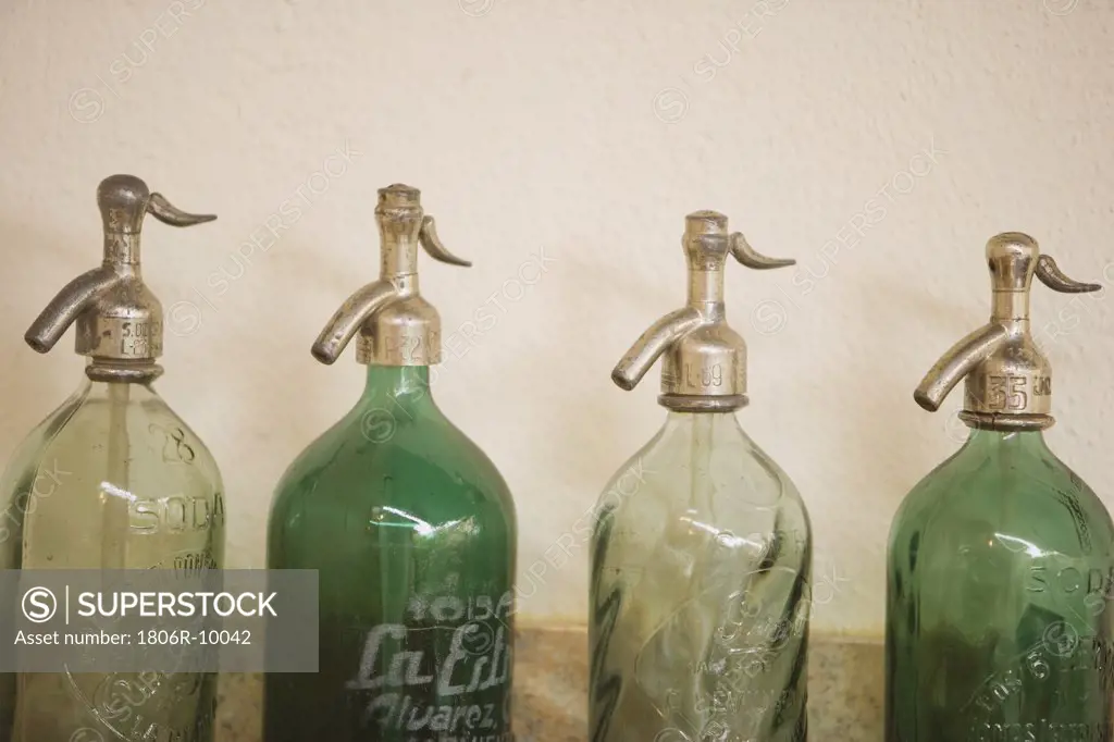 Line of Antique Pouring Bottles